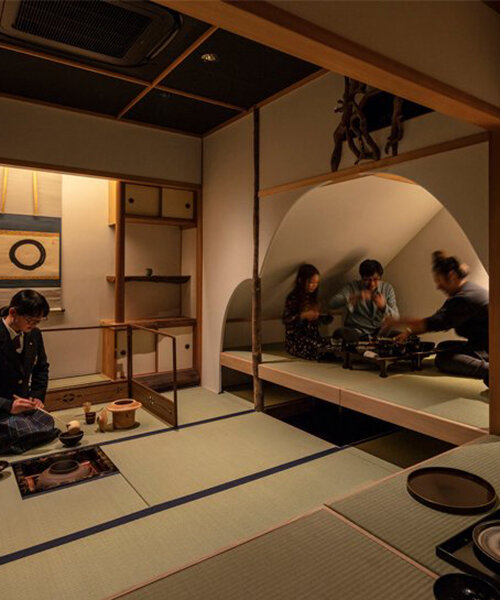 elevated teahouse interior in tokyo morphs traditional japanese- into western-style