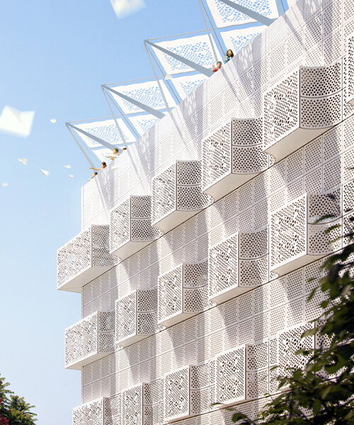 studio saar wraps its 'third space' in an intricate screen of water-jet cut white marble
