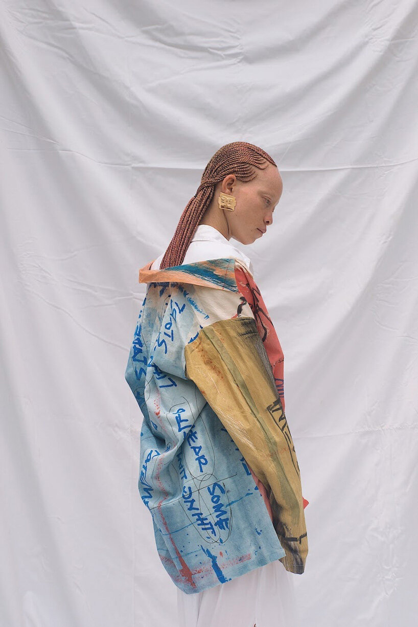 slum studio turns clothing waste into hand-painted clothes designboom