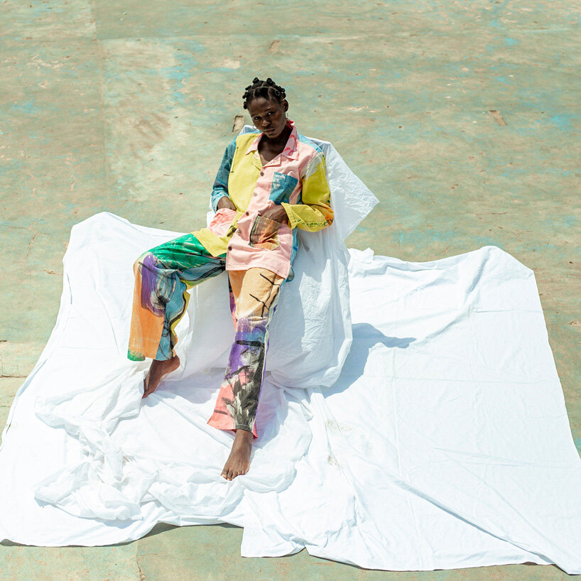 the slum studio is turning clothing waste into hand-painted apparel designboom