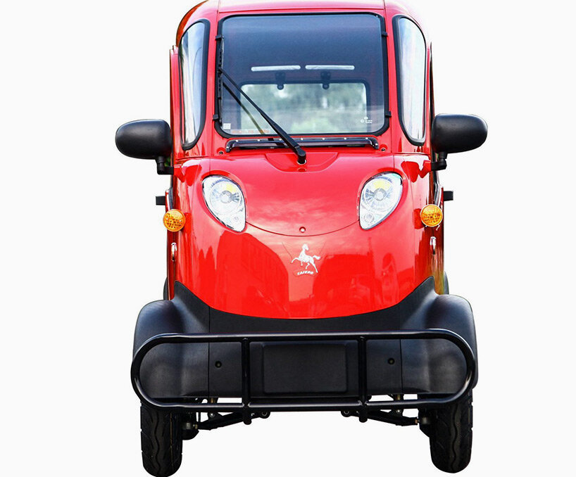 this super narrow electric car looks like an odd adult sized toy