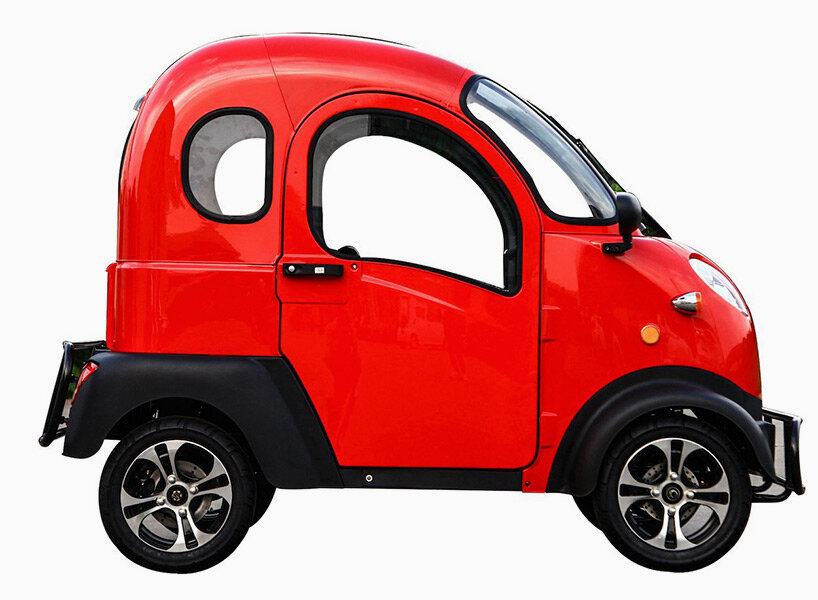 this super narrow electric car looks like an odd adult sized toy