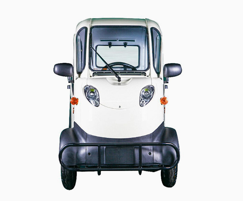 this super-narrow electric car looks like an odd adult-sized toy