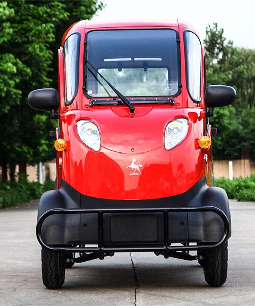 this super-narrow electric car looks like an odd adult-sized toy or a tiny submarine