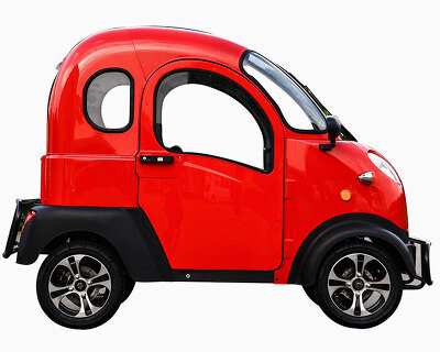 this super-narrow electric car looks like an odd adult-sized toy or a tiny submarine