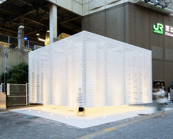 kashiwa sato completes 'clean and safe' tokyo toilet clad in white aluminum louvers