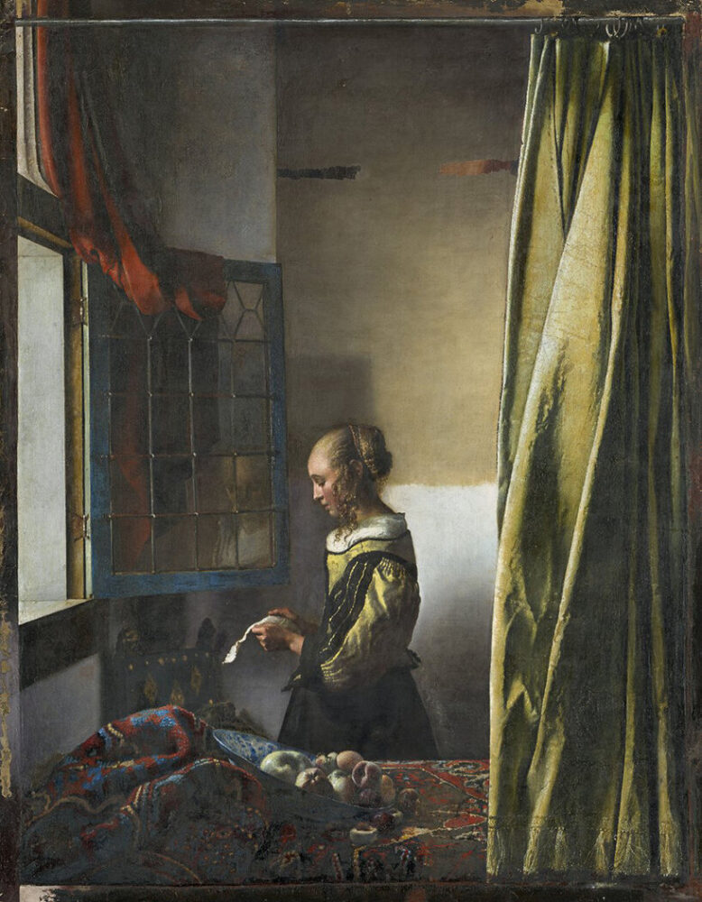 vermeer restoration uncovers a cupid hanging on the wall