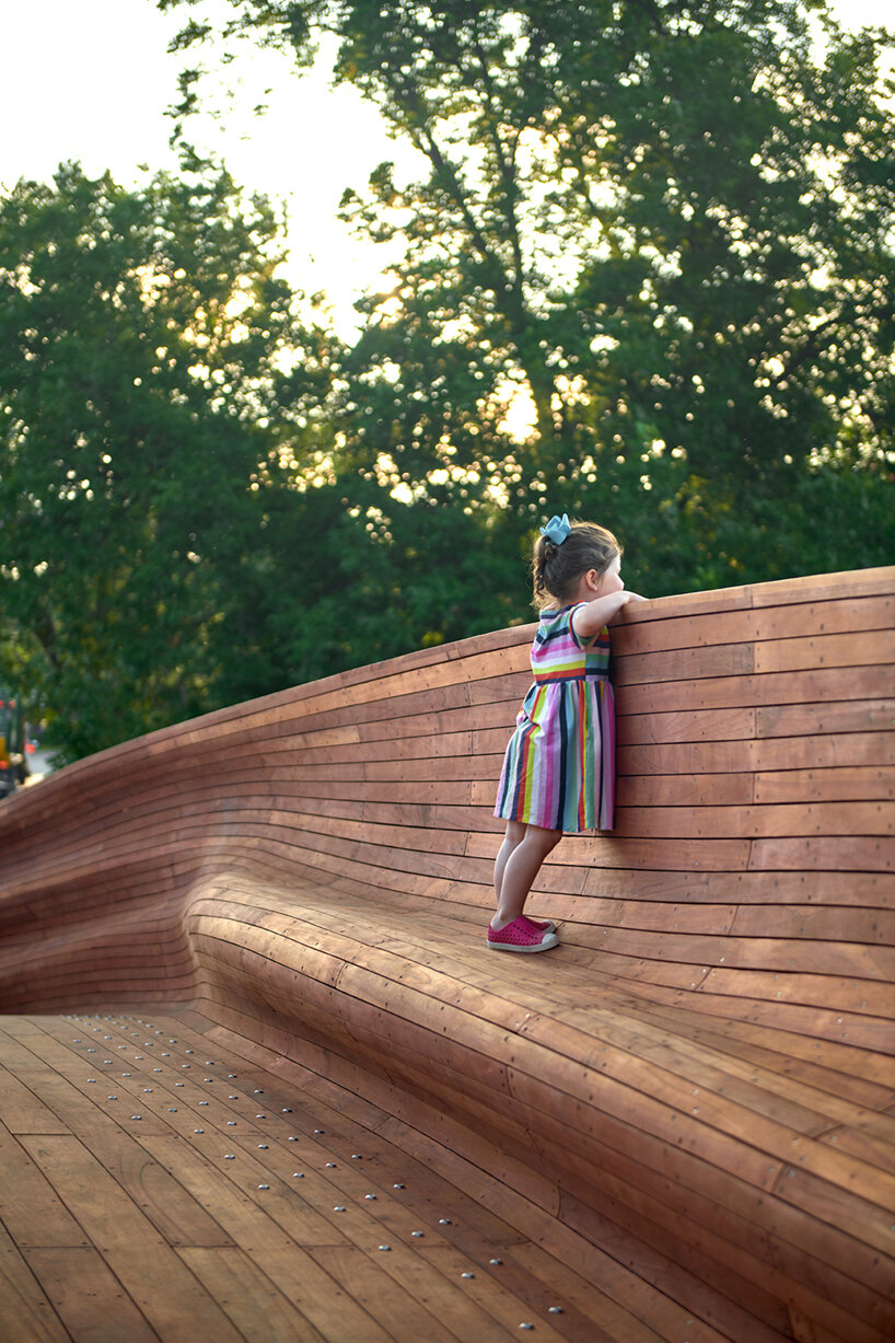 volkan alkanoglu takes cues from shipmaking to build undulating timber 'drift' bridge