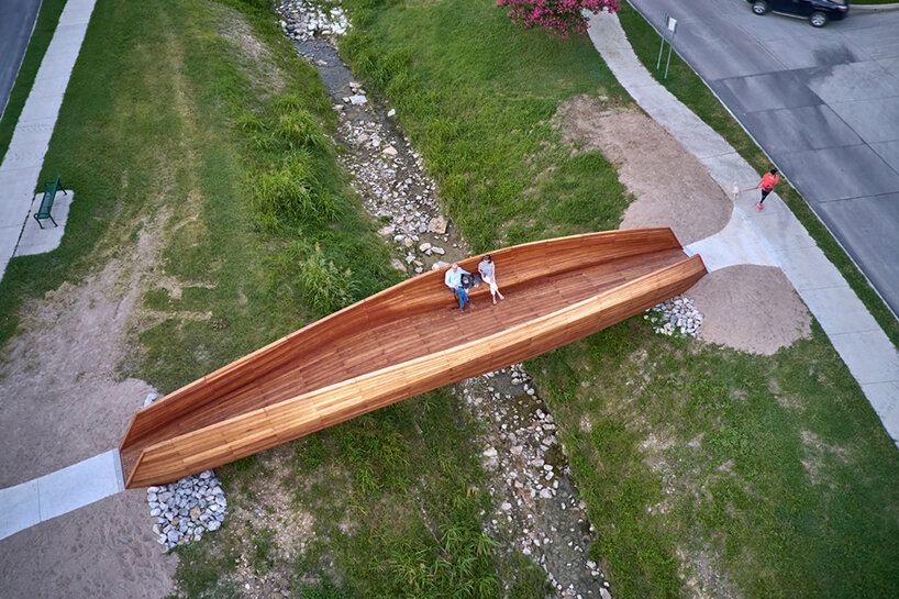 volkan alkanoglu takes cues from shipmaking to build undulating timber 'drift' bridge