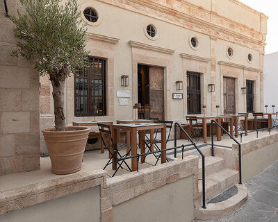 modern interior design completes the otherwise intact restaurant shell in greek island