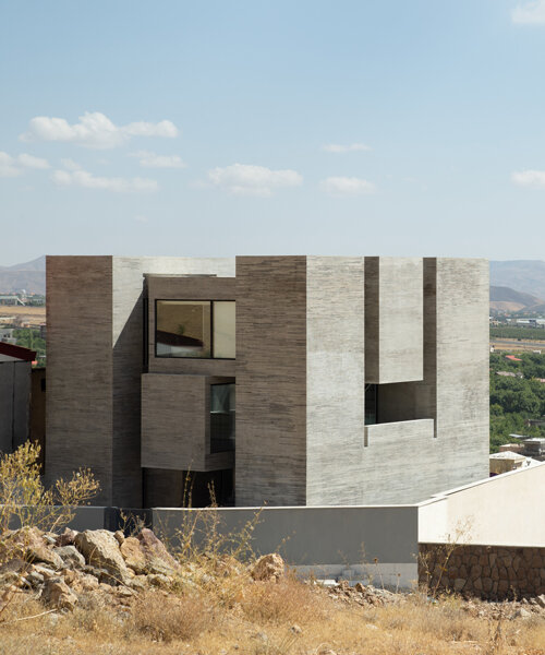 iranian studio MAAN sculpts its monolithic 'ayenevarzan house' of solids and voids