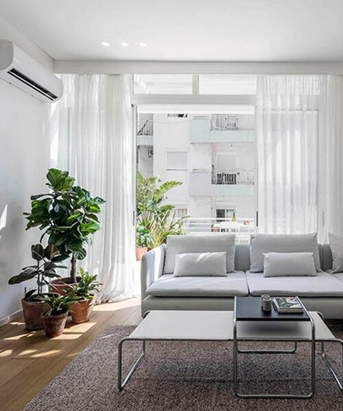 leafy plants + neutral tones take over light-filled penthouse in beirut, lebanon