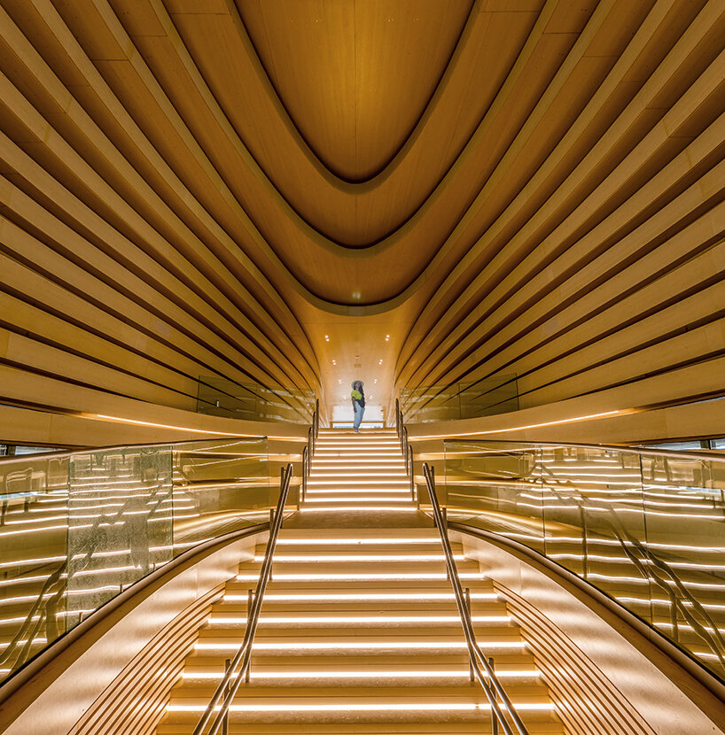 giant conical pavilion spells out poems with your contribution at expo 2020 dubai