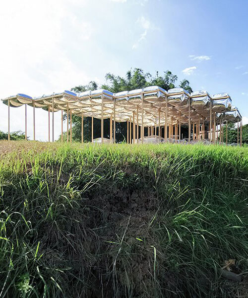 timber oasis gulao tea alcove emerges from the fish ponds of china