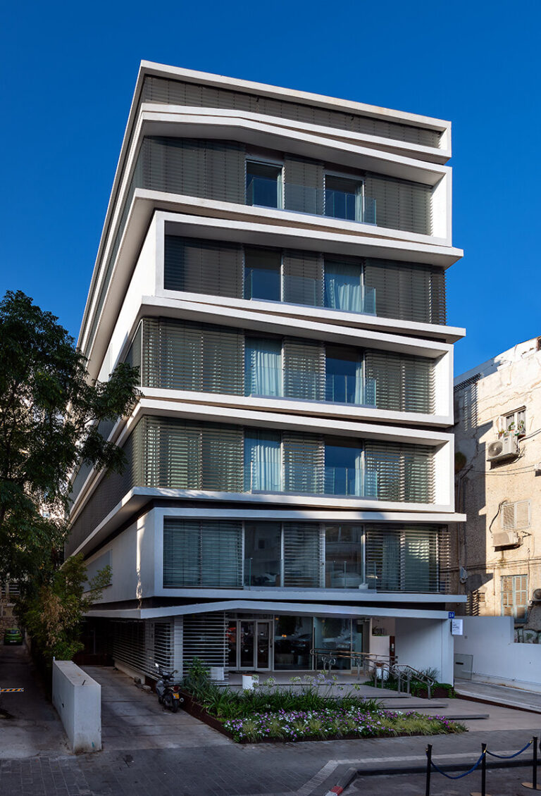 ink hotel emerges as a pile of stacked books in the heart of tel aviv ...