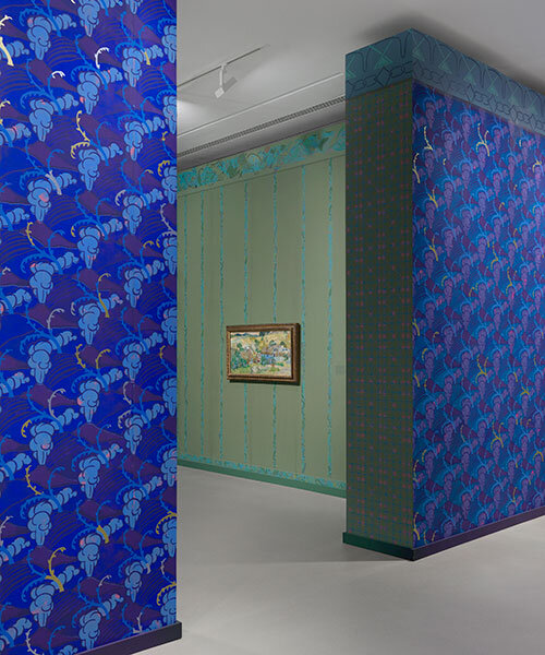 hand-painted wallpaper by laura owens wraps vincent van gogh exhibition in france