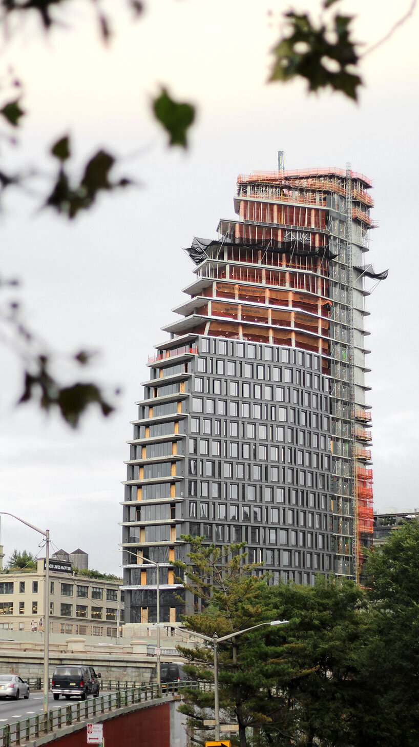 twisting 'olympia' tower takes shape along brooklyn's industrial waterfront