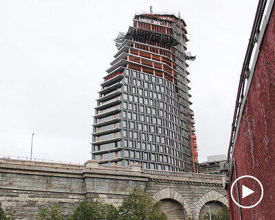 twisting 'olympia' tower takes shape along brooklyn's industrial waterfront