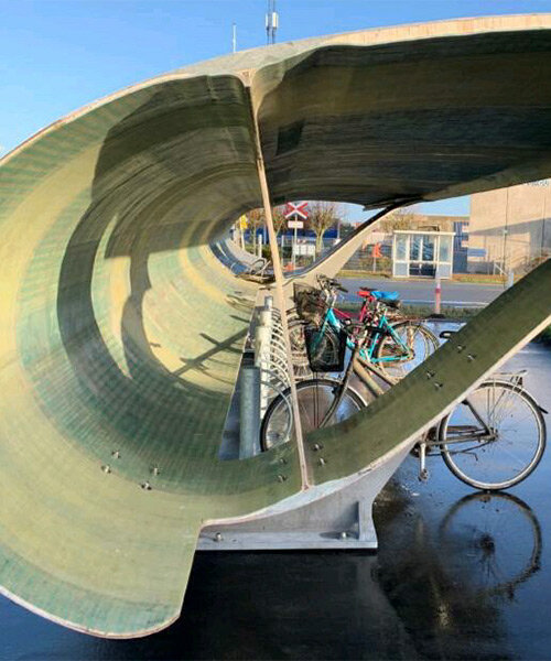 denmark is repurposing discarded wind turbine blades as bike shelters