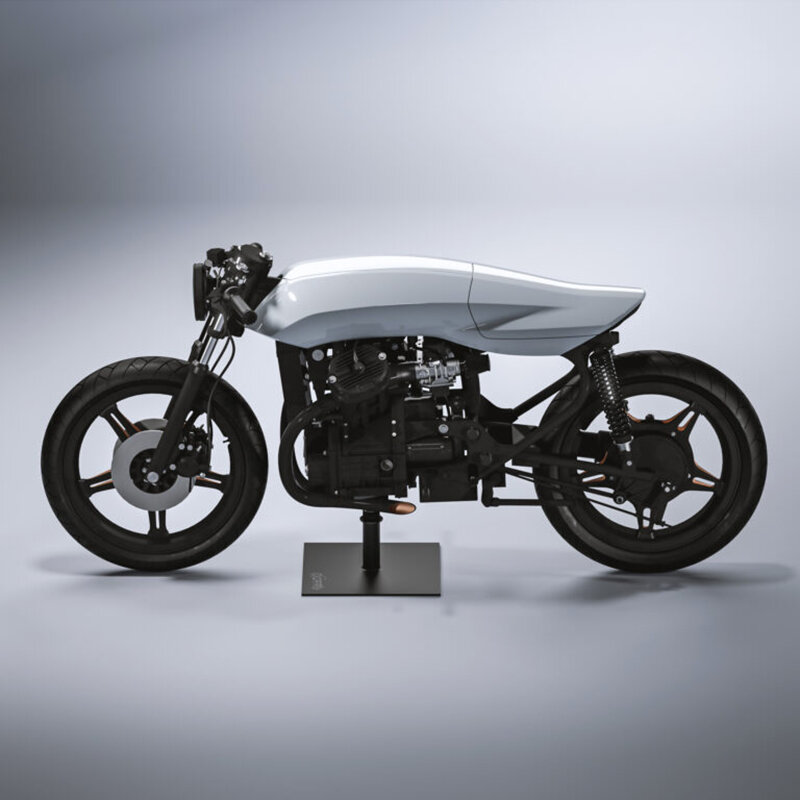 sculptural motorcycle exposes its handmade saddle through hidden cutout