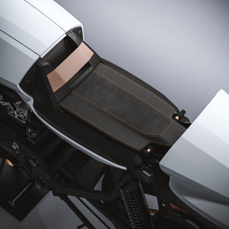 sculptural motorcycle exposes its handmade saddle through hidden cutout