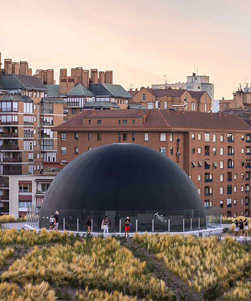 SpY reflects on the symbolism of the oculus with huge black sphere installation in spain