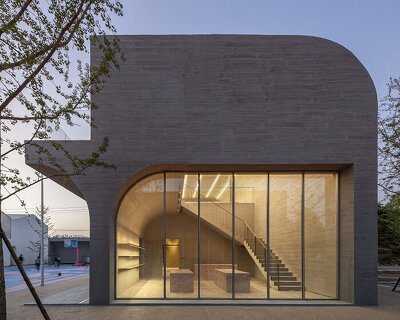 abstracted concrete arches dominate the qinchang village town hall in china