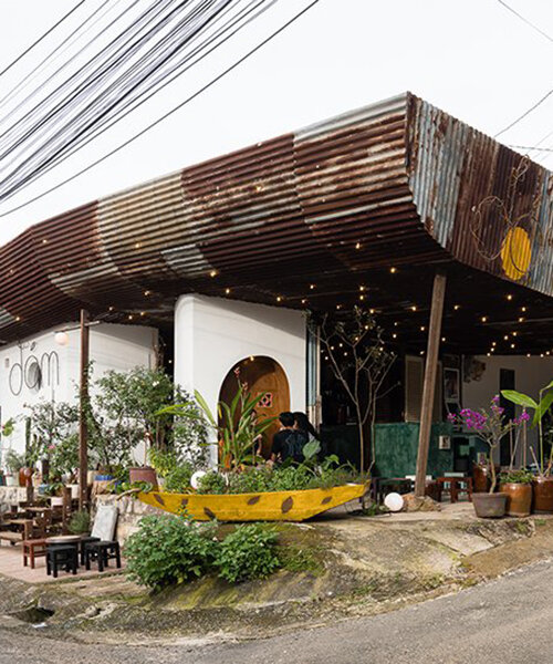 vivid coffee shop in vietnam incorporates different materials and shapes
