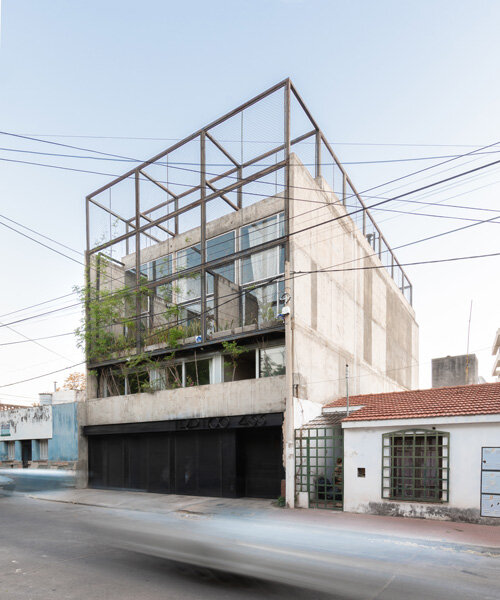 three vertical houses compose concrete 'triptico' building in córdoba, argentina