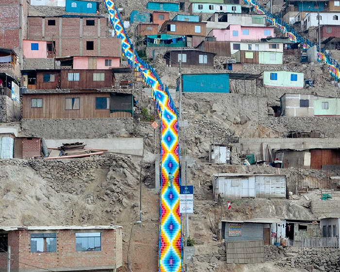 xomatok references traditional andean textiles in staircase murals in peru