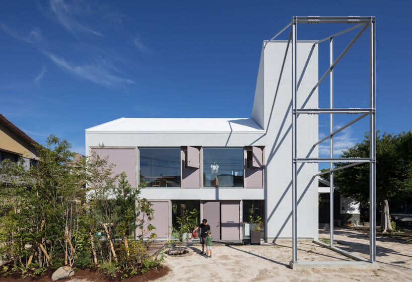 yHa architects rebuilds a historic façade for new office in fukuoka, japan 