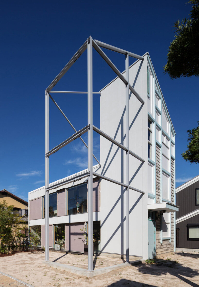 yHa architects rebuilds a historic façade for new office in fukuoka, japan 