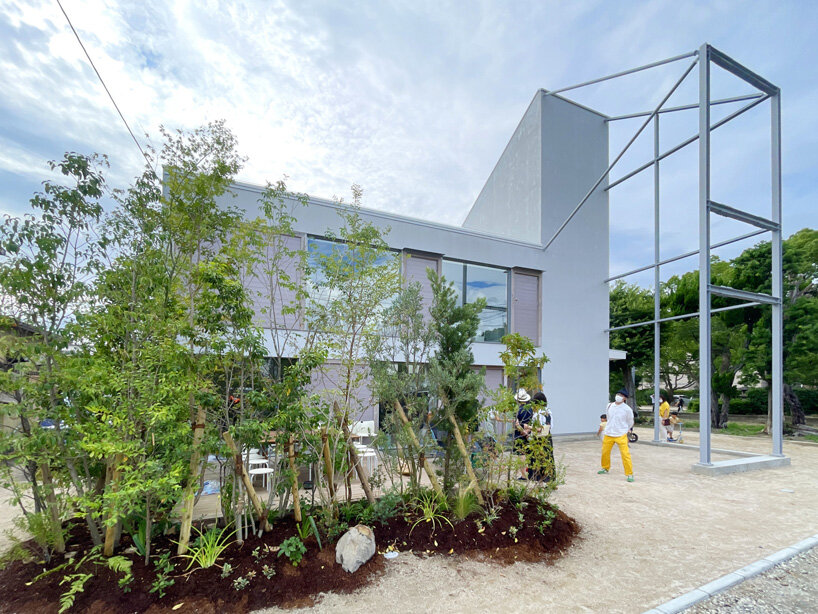 yHa architects rebuilds a historic façade for new office in fukuoka, japan 