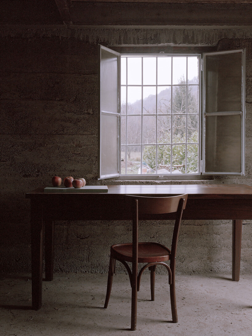 a25 architetti's barn renovation in northern italy reinterprets tradition in a contemporary way