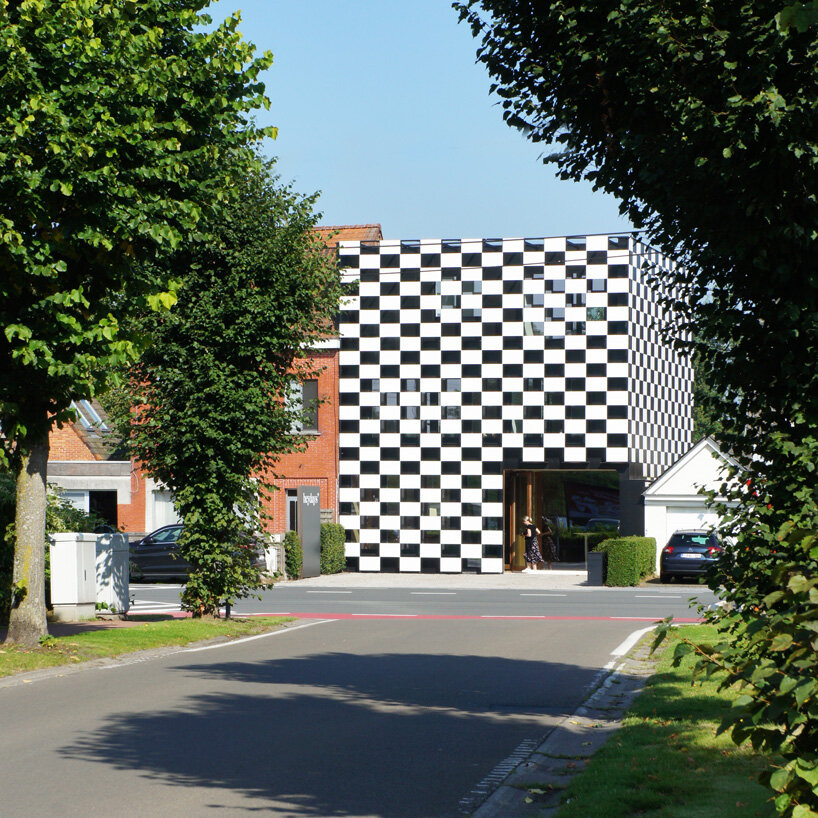 checkered office building in belgium is designed to 'stand out from the crowd'