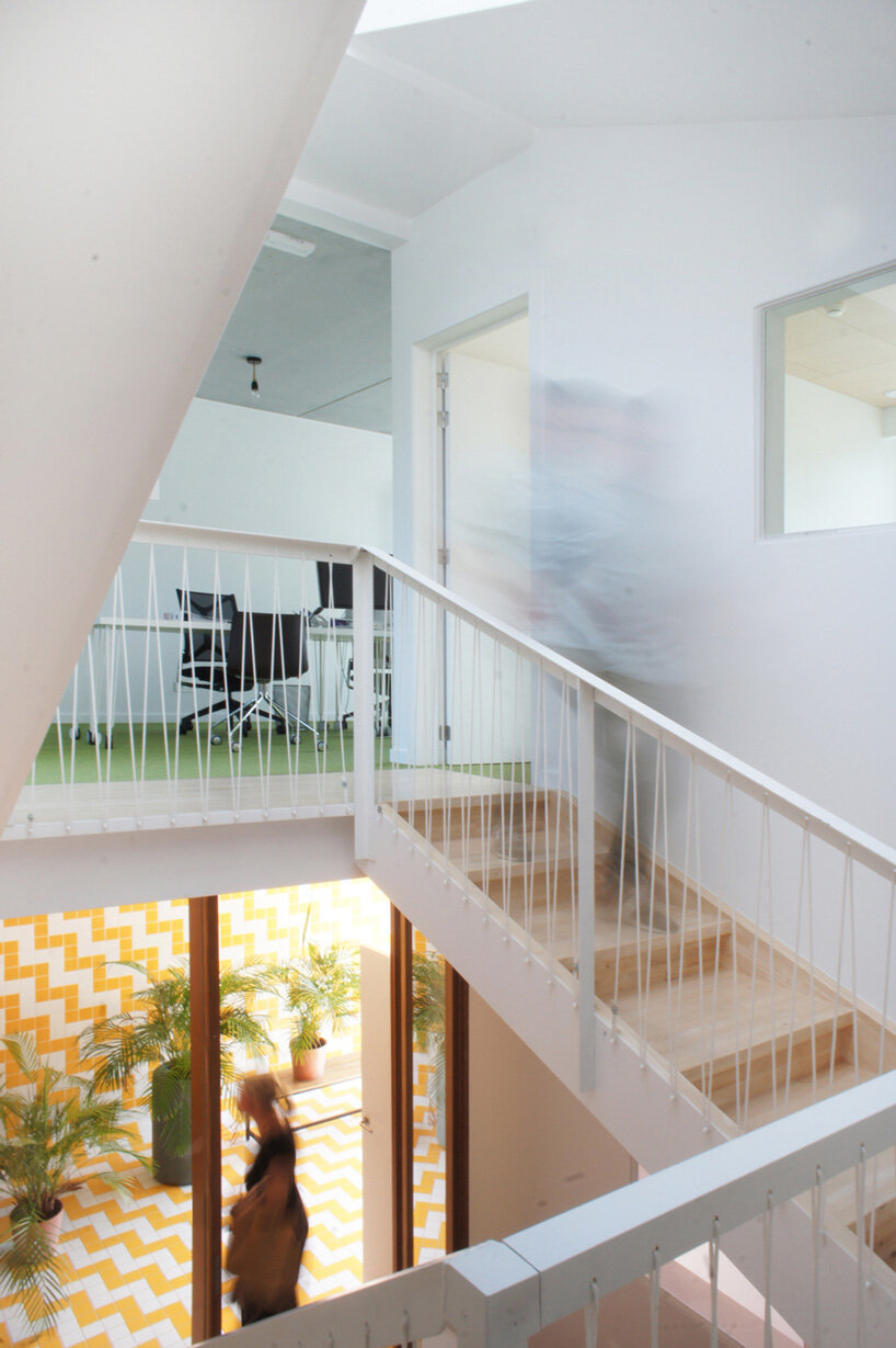 checkered office building in belgium is designed to 'stand out from the crowd'