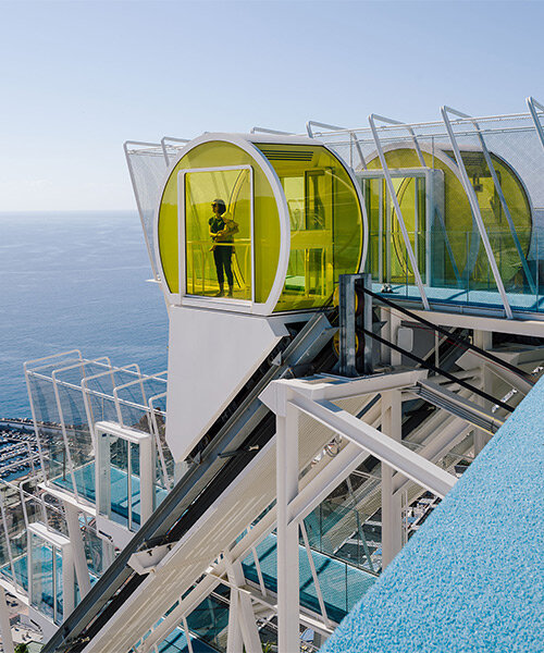 bright yellow funicular breathes new life into neglected 70s hotel in gran canaria