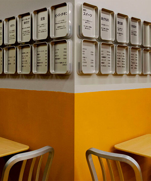 bright yellow tones clad renovated fried food shop in the suburbs of tokyo