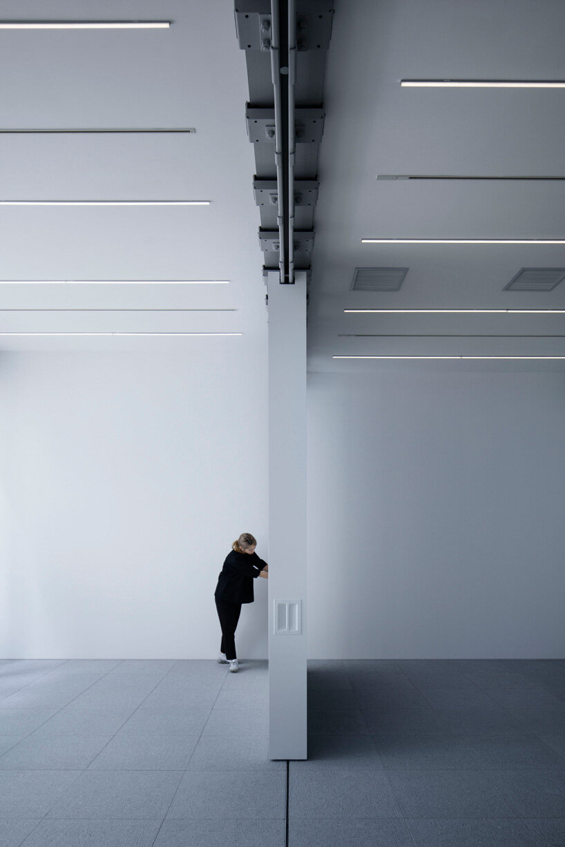CASE-REAL installs movable walls inside a basement art gallery in tokyo