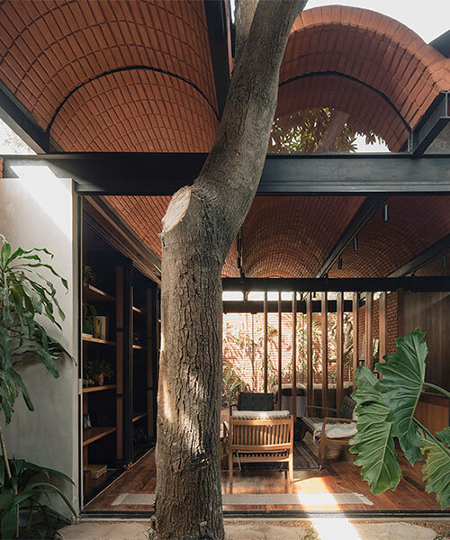 compressed earth blocks and a vaulted roof complete this intermediate house in paraguay
