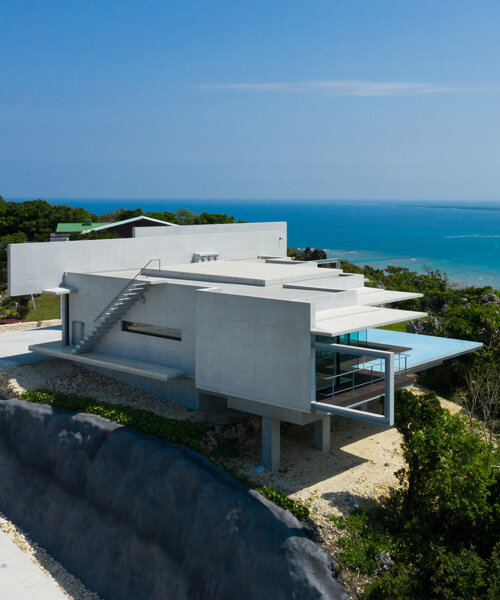 concrete hilltop villa by kidosaki architects studio overlooks the pacific ocean in japan