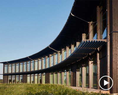curved layout forms intimate working environment capturing the danish landscape