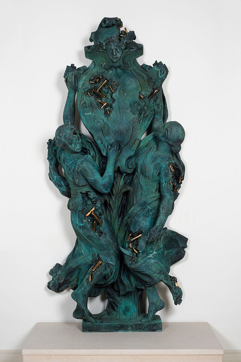 daniel arsham revives renowned bronzes in a series of eroded sculptures