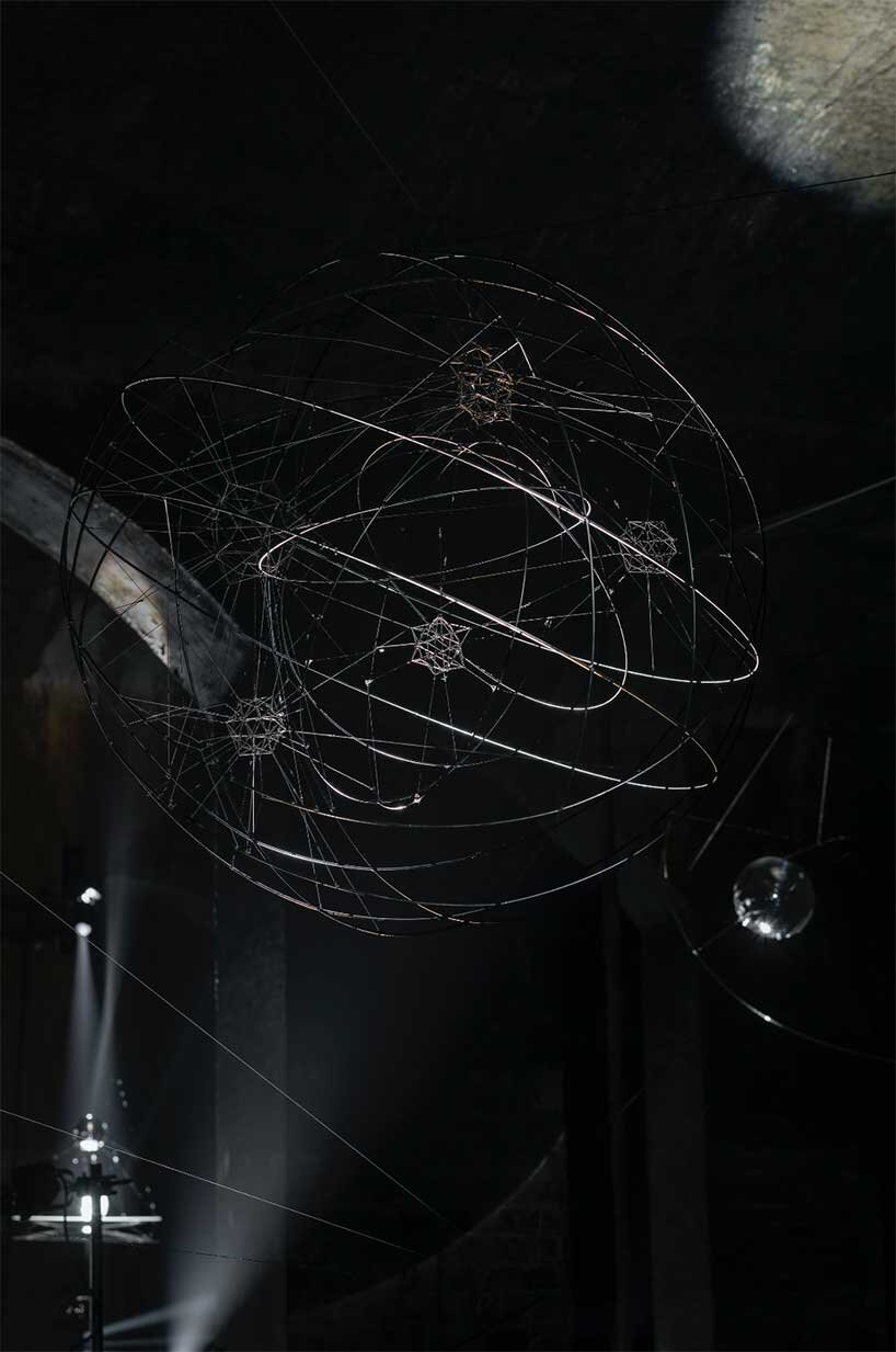 luminous sculptures hover within tomás saraceno's floating exhibition in cisternerne