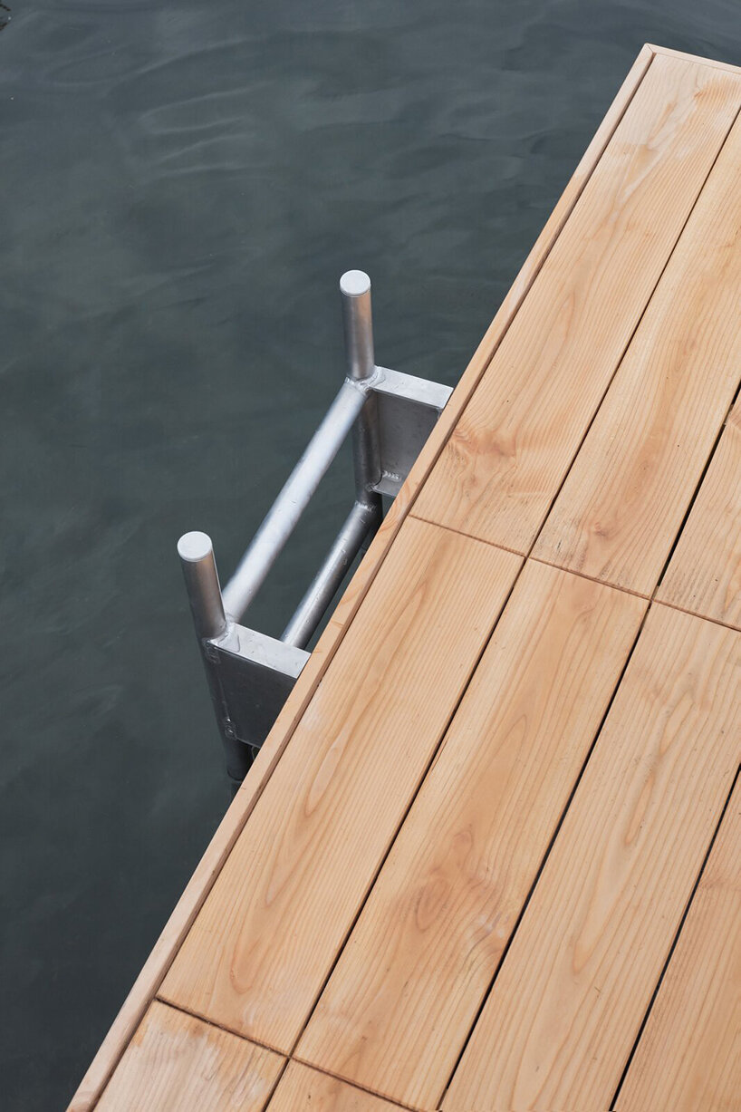 enjoy a steam aboard this floating prefab sauna on lake geneva