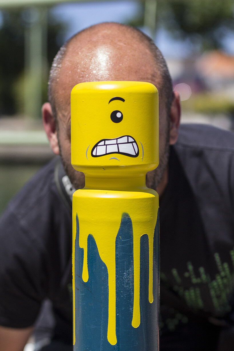 urban artist le cyklop unleashes angry one-eyed LEGOs in the streets of france