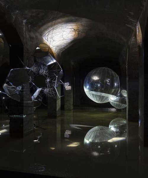 luminous sculptures hover within tomás saraceno's floating exhibition in cisternerne