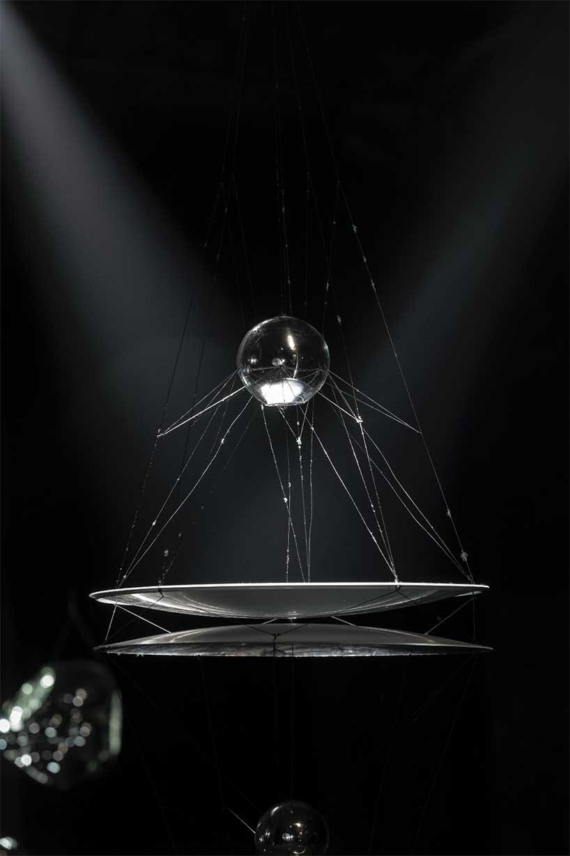 luminous sculptures hover within tomás saraceno's floating exhibition in cisternerne
