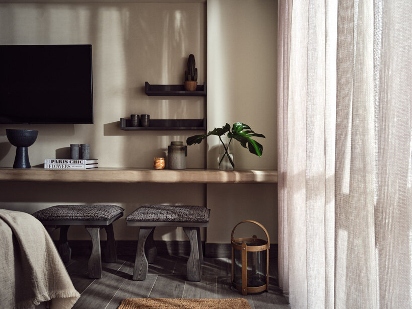 studio lost blends numo ierapetra resort into secluded beach in crete