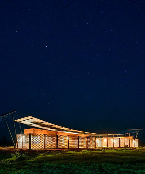 office building in rural paraguay is topped by 'smiling' roof that collects rainwater